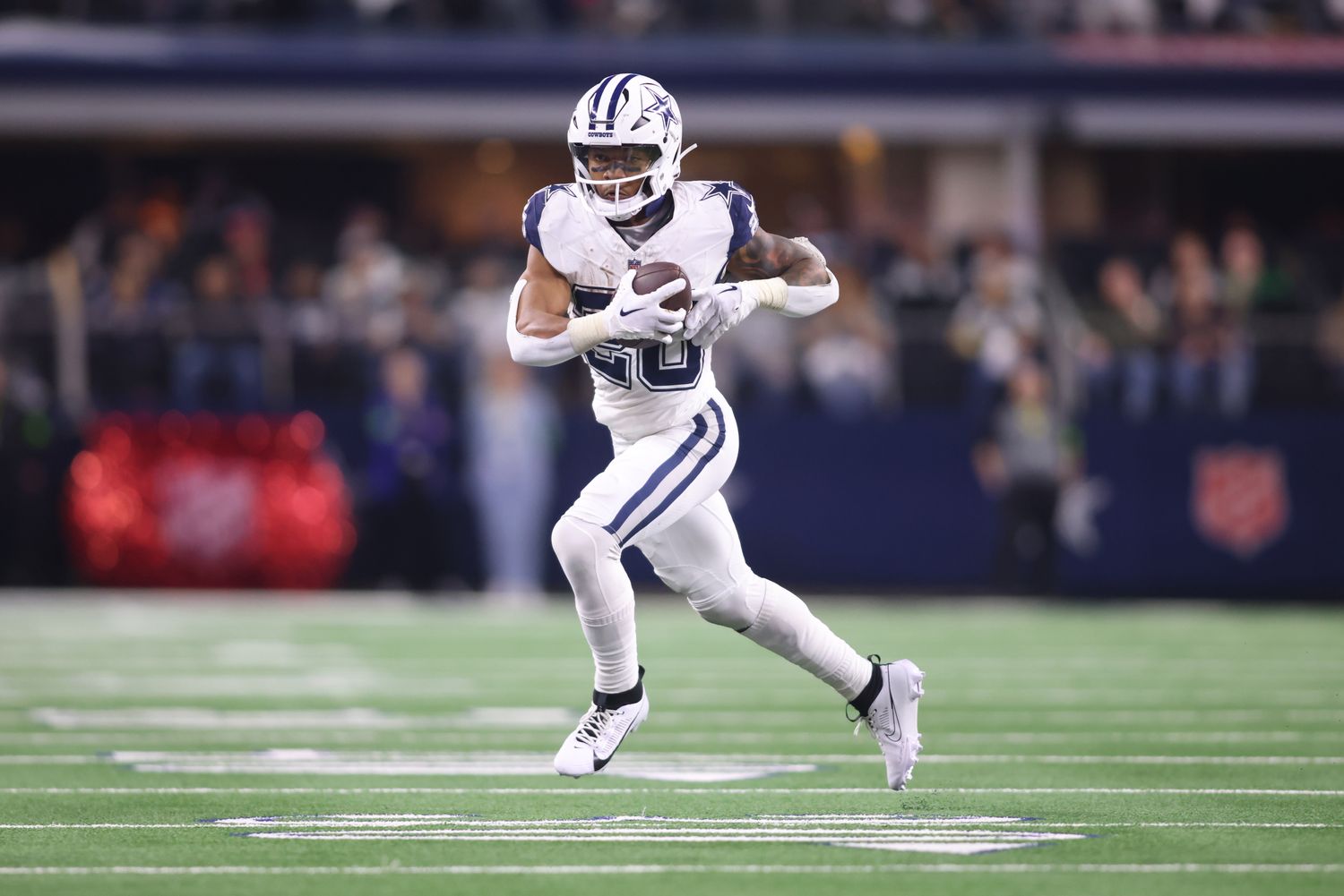 Dec 10, 2023; Arlington, Texas, USA; Dallas Cowboys running back Tony Pollard (20) runs the ball against the Philadelphia Eagles in the game at AT&T Stadium. Mandatory Credit: Tim Heitman-USA TODAY Sports  